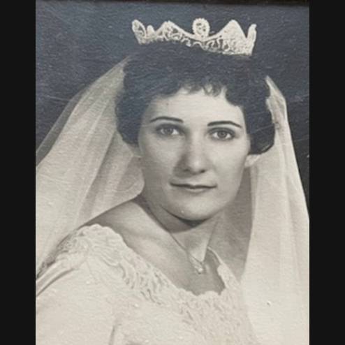 A black and white portrait photo of Shirley E. Nagy formerly Waldo posing on her wedding day
