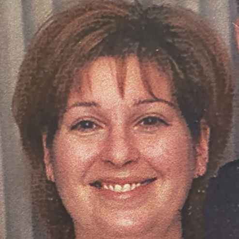 A close-up photo of Lynnette M. DeSantis formerly Wintrick, smiling for the camera