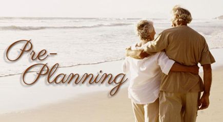 A photo of a couple walking along the beach and the words "Pre-Planning" beside them