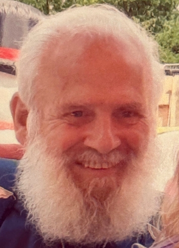 A close-up photo of Raymond Joseph Grubiss Sr. smiling